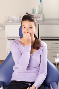 Woman Nervous In Dental Chair